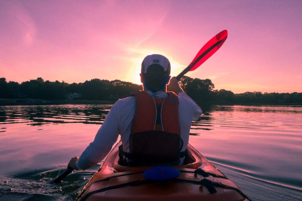 Man canoeing on water - Brain Training blog post